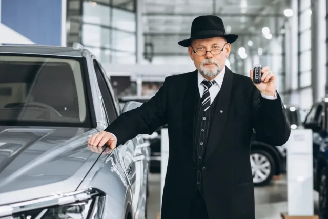 a female is seeing sold car documents